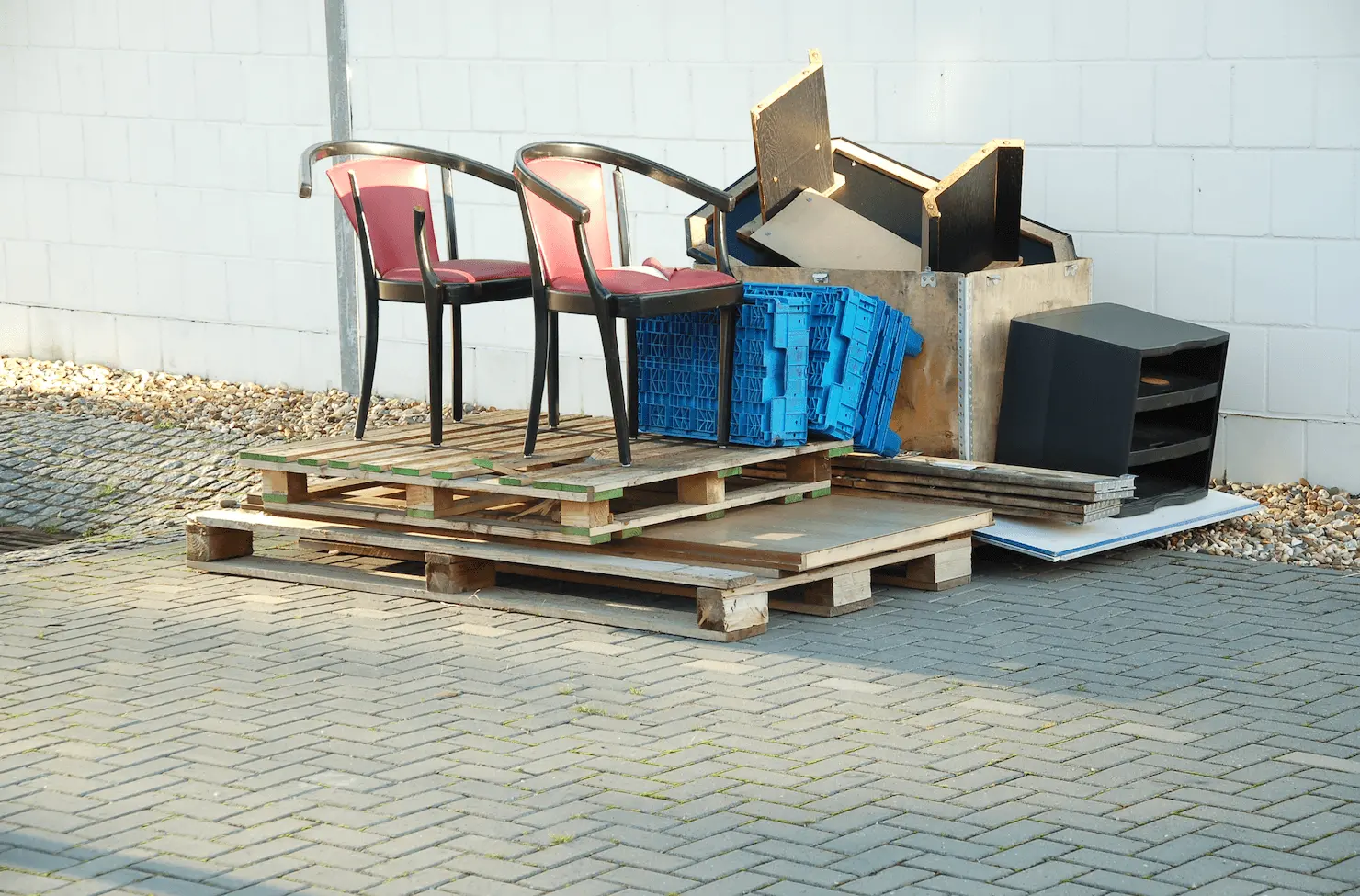 Bulk waste stacked on wooden pallets